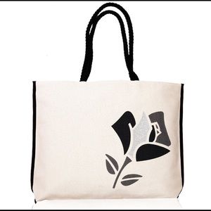 Lancôme canvas tote with travel size beauty items